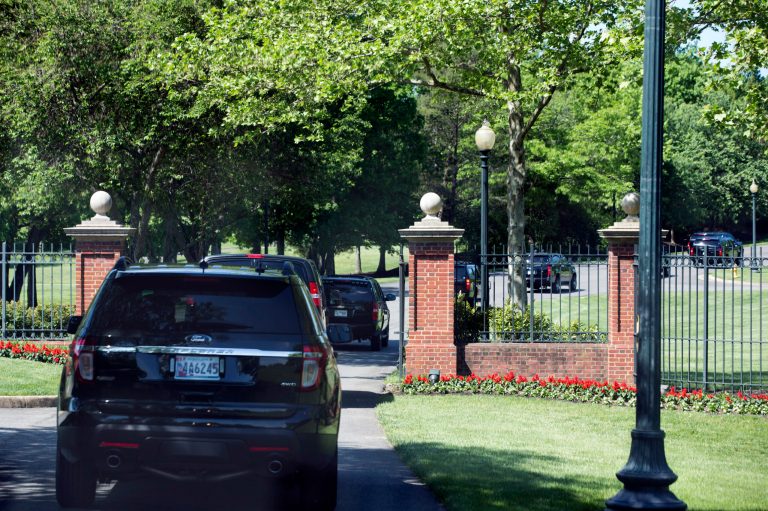 The motorcade carrying President Barack Obama arrives at the Robert Trent Jones Golf Course where the president is expected to play golf in Gainesville, Va., on Saturday, May 17, 2014. (AP Photo/Jacquelyn Martin)