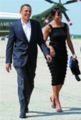 President Barack Obama and first lady Michelle Obama depart Andrews Air Force Base, Md., en route to New York where they will have a private dinner and attend a play, Saturday, May 30, 2009. (AP Photo/J. Scott Applewhite)