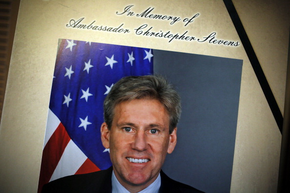WASHINGTON, DC - SEPTEMBER 14:  A portrait of Ambassador J. Christopher Stevens is placed along with a condolence book outside the room of Senate Foreign Relations Committee at the U.S. Capitol September 14, 2012 in Washington, DC. Ambassador Stevens and three other Americans were killed in an attack on the U.S. Consulate in Benghazi, Libya on September 11, 2012.  (Photo by Alex Wong/Getty Images)