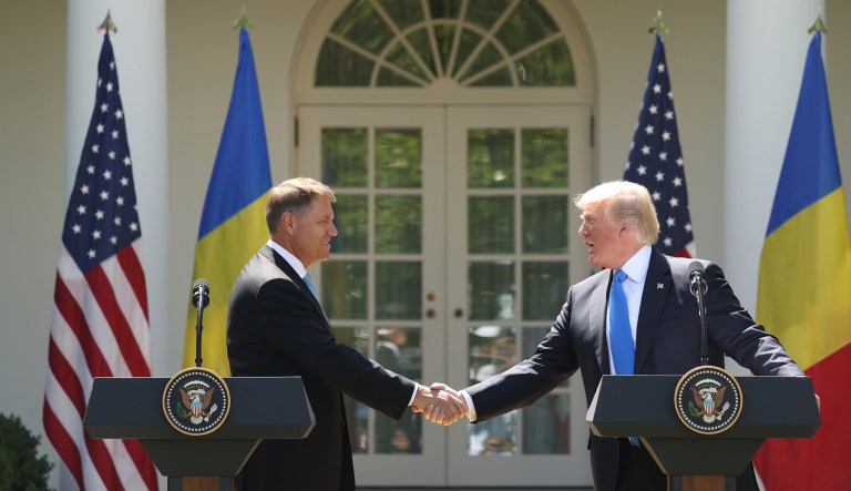 President Donald Trump, accompanied by Romanian President Klaus Werner Iohannis, shake hands during a news conference in the Rose Garden at the White House, Friday, June 9, 2017, in Washington. (AP Photo/Andrew Harnik)