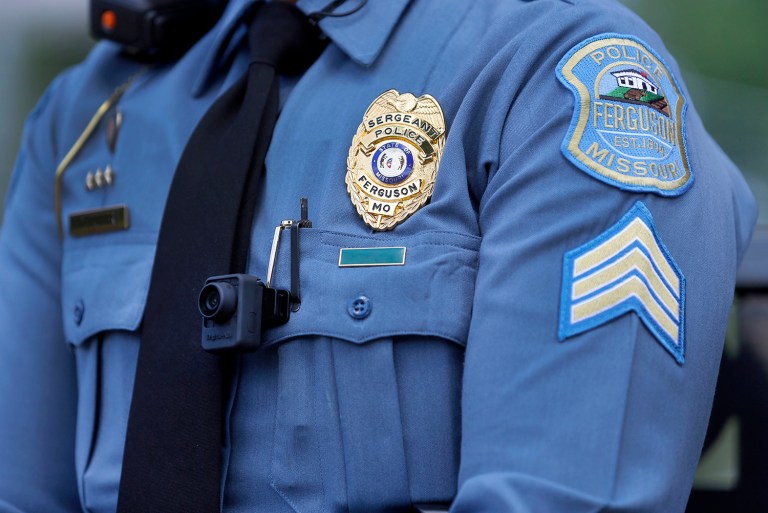 The largest developer and manufacturer of tasers and police-worn body cameras announced on Wednesday is launching a new program to equip every police officer in America with a body camera. (AP Photo/Jeff Roberson, File)