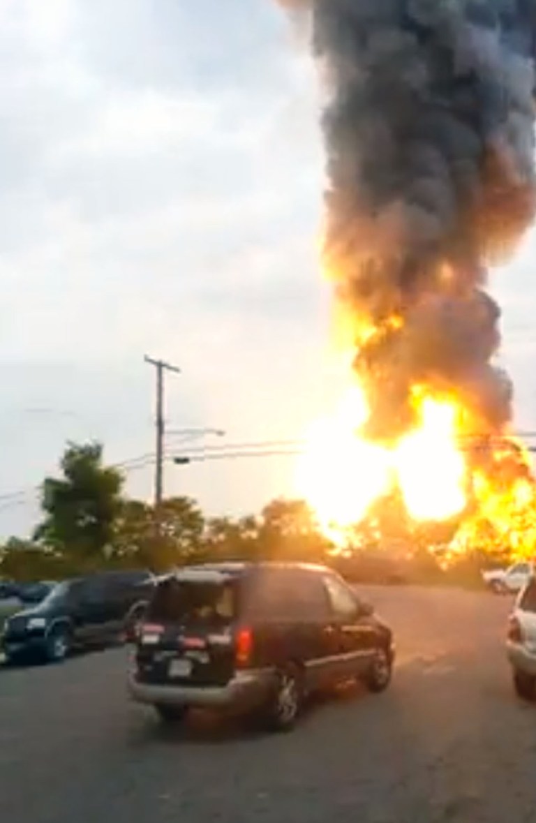 This still taken from video provided by James LeBrun shows an explosion outside Baltimore on Tuesday, May, 28, 2013. Baltimore County fire officials say a train derailed in a Baltimore suburb on Tuesday and an explosion was heard in the area. A fire spokeswoman says the train derailed about 2 p.m. Tuesday in White Marsh, Md. (AP Photo/James LeBrun)