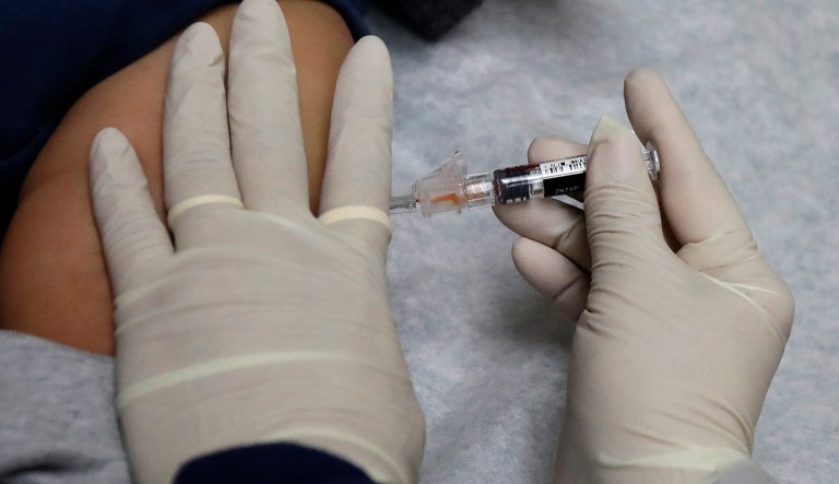 According to an update by the Centers for Disease Control and Prevention, the flu is now widespread in every state except Hawaii. (AP Photo/Ted S. Warren)