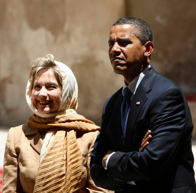 President Barack Obama, right, tours the Sultan Hassan Mosque with then-Secretary of State Hillary Rodham Clinton in Cairo, Egypt. President Barack Obama formally endorsed Hillary Clinton's bid for the White House on Thursday. (AP Photo/Gerald Herbert)
