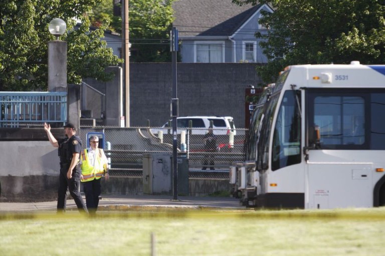 At least two of the victims attempted to step in and calm Christian down. But the 35-year-old stabbed them and one other person before leaving the train. (Jim Ryan/The Oregonian via AP)