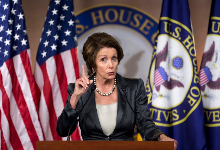 House Minority Leader Nancy Pelosi of Calif. gestures during a news conference about the ongoing budget fight, Thursday, Oct. 3, 2013, on Capitol Hill in Washington. The government limped into a third day of partial shutdown Thursday with no sign of a way out after a White House conversation between President Barack Obama and top congressional leaders seemed only to harden the stances of Democrats and Republicans. (AP Photo/ Evan Vucci)