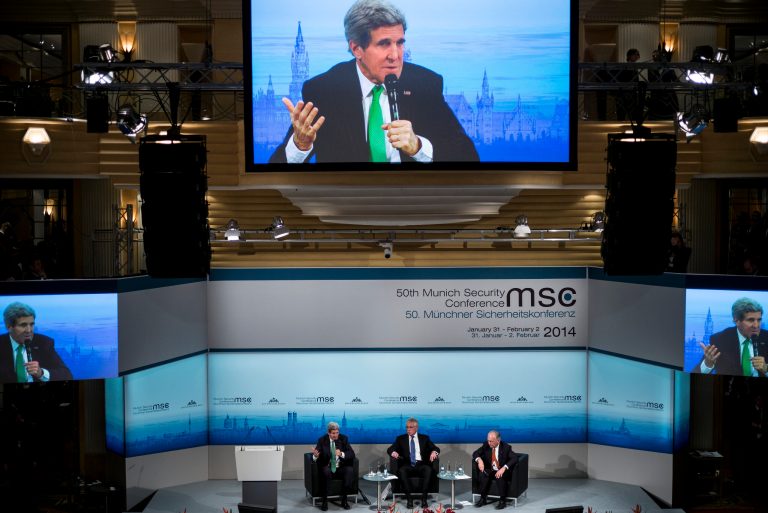US Secretary of Defense Chuck Hagel , center, and Wolfgang Ischinger, right,  chairman of the Munich Security Conference, listen as US Secretary of State John Kerry, left,  speaks during the Munich Security Conference at the Bayerischer Hof Hotel Saturday Feb. 1,  2014 in Munich, southern Germany. The annual meeting was set to deal with thorny international issues, from the Syrian war and Ukraine's turmoil to Iran's nuclear program  and US online surveillance.  (AP Photo/Brendan Smialowski,Pool)
