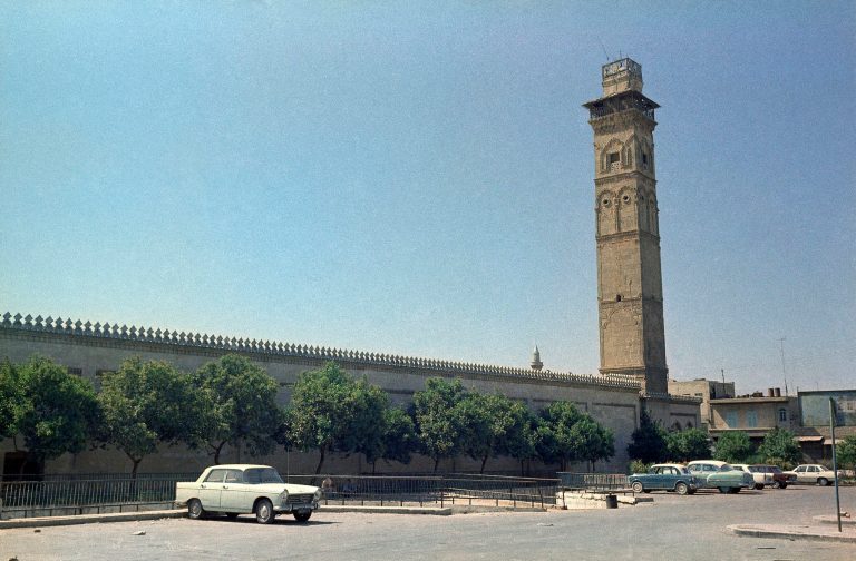 FILE - In this Saturday, Sept. 22, 1973 file photo, cars are parked outside the Umayyad Mosque in Aleppo, Syria. Syrian state media and anti-government activists said Wednesday, April 24, 2013 that the minaret of the famed Umayyad Mosque in Aleppo has been destroyed. The 12th century mosque fell into rebel hands earlier this year after heavy fighting that damaged the historic compound. The area around it, however, remains contested. Syrian troops are about 200 metres (yards) away.(AP Photo/Azad, File)