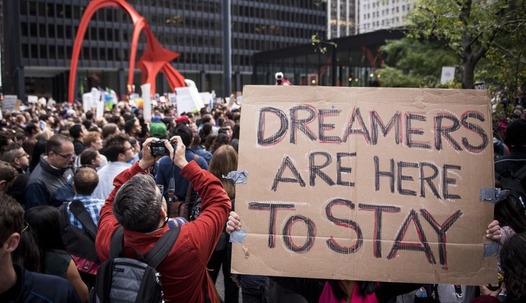 A new poll found that 79 percent believe Dreamers should be allowed to stay and apply to become citizens. Seven percent think Dreamers should be allowed to stay in the U.S., but shouldn't be permitted to apply for citizenship. (Christopher Dilts/Bloomberg)