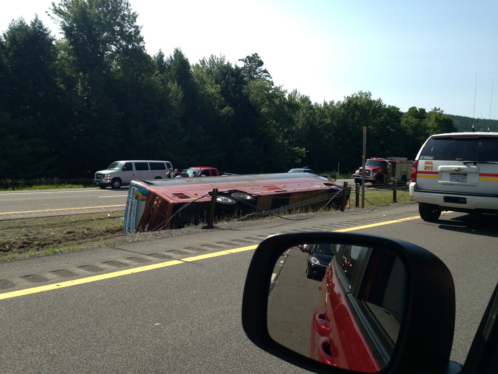 Tour bus rolls over on Adirondack Northway in NY