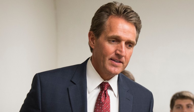 Sen. Jeff Flake said that Trump is sending the wrong message by discussing backing out of a trade deal between the U.S. and South Korea while North Korea has developed a hydrogen bomb. (AP Photo/Evan Vucci)