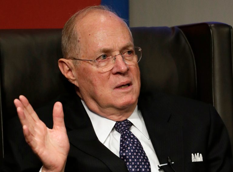 FILE - This Oct. 13, 2013 file photo shows Supreme Court Justice Anthony Kennedy speaking in Philadelphia. The Supreme Court on Wednesday said a federal law limits how much money victims of child pornography can recover from people who viewed their images online, throwing out a nearly $3.4 million judgment in favor of a woman whose childhood rape has been widely seen on the Internet. Kennedy said for the court that federal judges should exercise discretion in awarding restitution. The case involved a woman known in court papers by the pseudonym 