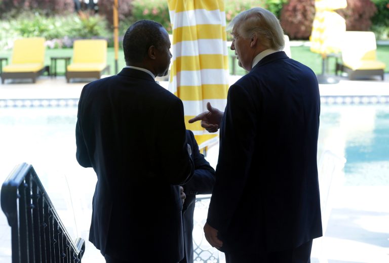 Ben Carson, left, believes the GOP is ganging up to block Donald Trump, right, from winning the presidency. (AP Photo/Lynne Sladky)