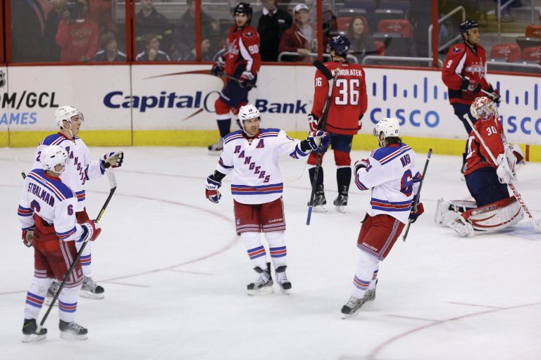 Rob Carr/Getty Images
The Rangers' Brad Richards, center, salted away the game with a goal late in the third period as the Capitals lost for the second time in two days to a team from New York.