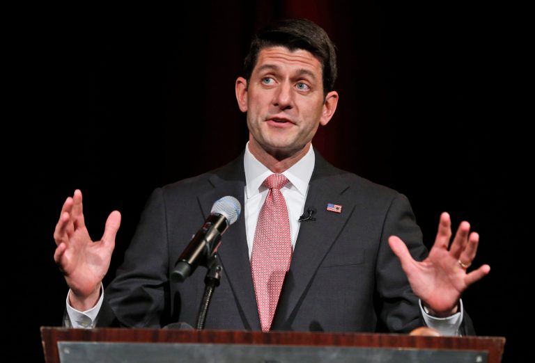 US Rep. Paul Ryan, R-Wis., gestures as he speaks during a gala prior to the start of the Virginia GOP Convention in Roanoke, Va., Friday, June 6, 2014. (AP Photo/Steve Helber)