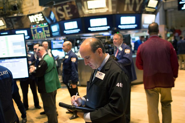 Traders work at the New York Stock Exchange, Friday, May 8, 2015 in New York. (AP)