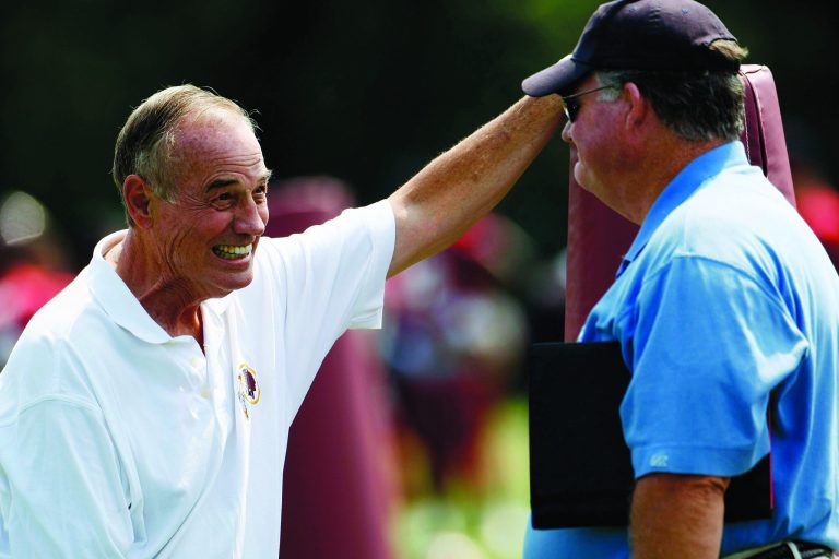 Win McNamee/Getty Images
Hall of Fame linebacker Sam Huff, left, will work only 12 of 20 Redskins games this season as a broadcaster for Red Zebra.
