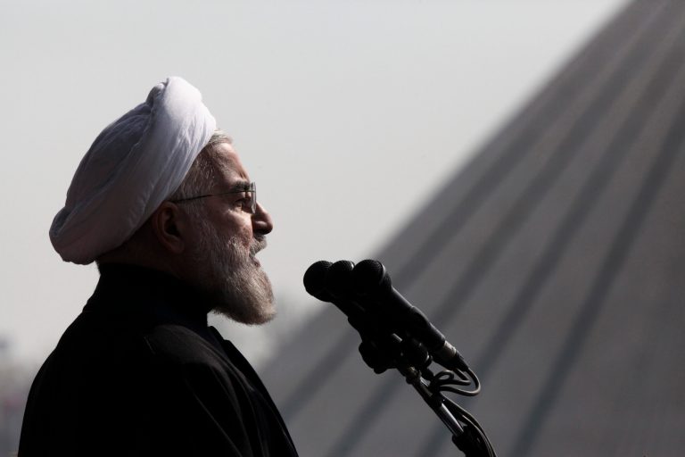 FILE -- In this Tuesday, Feb. 11, 2014 file photo, Iranian President Hassan Rouhani, delivers a speech during an annual rally commemorating anniversary of the 1979 Islamic revolution, at the Azadi 'Freedom' Square in Tehran, Iran. Rouhani said Sunday, May 11, 2014 that his country has nothing to offer except transparency in nuclear talks with world powers, rebuffing hard-liners as negotiators seek a final deal over the Islamic Republic's contested program. (AP Photo/Vahid Salemi, File)