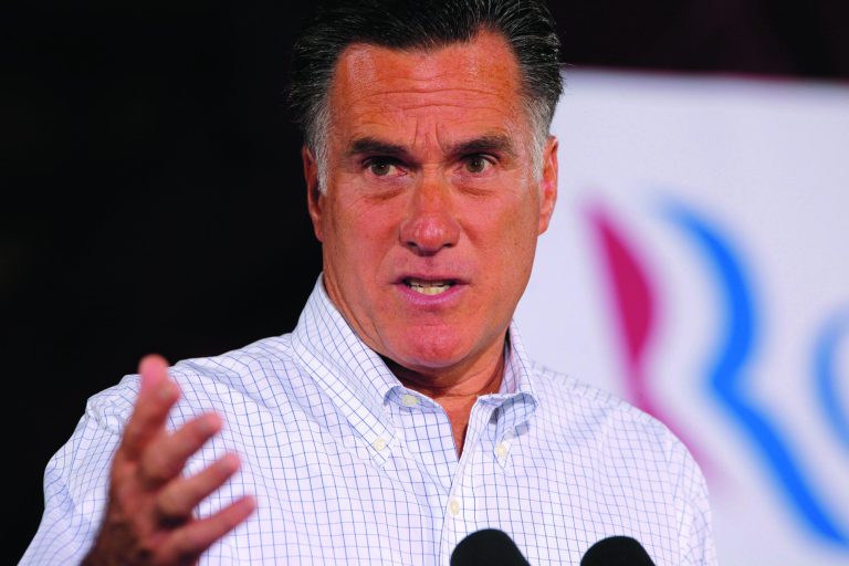 In this Aug. 3, 2012, photo, Republican presidential candidate, former Massachusetts Gov. Mitt Romney speaks to reporters after he campaigned at McCandless Trucking in North Las Vegas, Nev. Leading Republicans on Sunday, Aug. 5, 2012, accused the Senate Democratic leader Harry Reid of lying by passing along an anonymous claim that GOP presidential candidate Mitt Romney hasn't paid taxes for 10 years. Republican Party chairman Reince Priebus called Reid a 