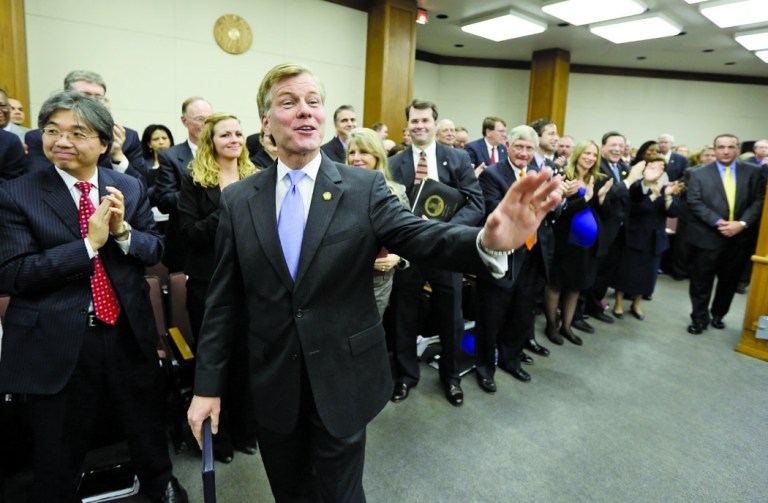 Virginia Gov. Bob McDonnell waves to legislators after he addressed a joint meeting of the House Appropriations and Senate Finance committees at the Capitol Monday, Dec. 17, 2012 in Richmond, Va. McDonnell delivered his 2013 budget reccomendations to the committees. (AP Photo/Steve Helber)