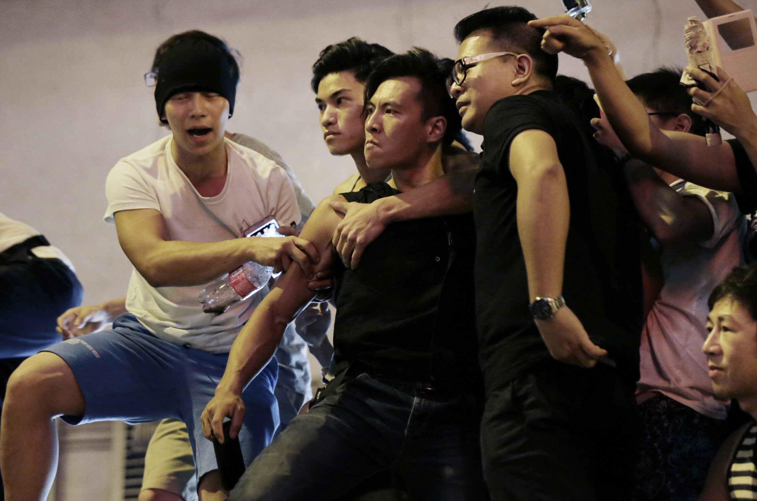 Hong Kong police arrest 19 in protest clash