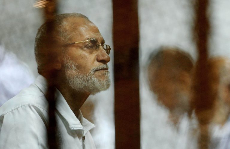 Leader of Egypt's Muslim Brotherhood Mohammed Badie sits inside a defendants cage during his trial in Cairo, Egypt, Wednesday, April 30, 2014. (AP Photo/Ahmed Omar) EGYPT OUT