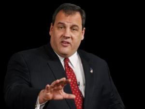 Christie takes swipe at Perry on immigration