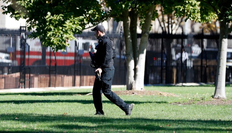 Guns were drawn by Secret Service members at the White House. (AP Photo/Alex Brandon)