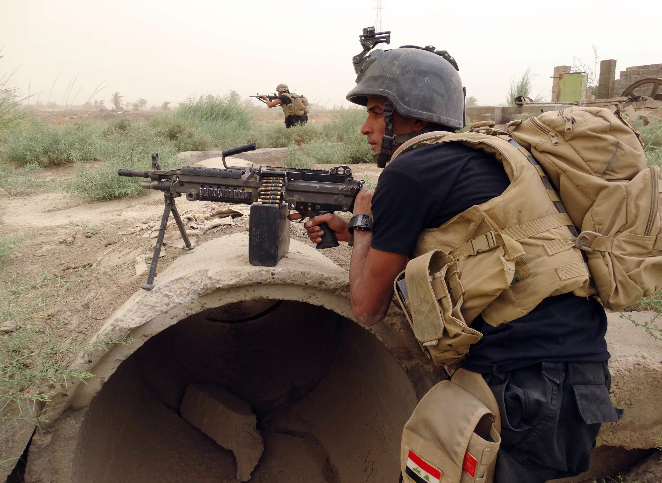 Iraqi forces losing ground to ISIS in key city