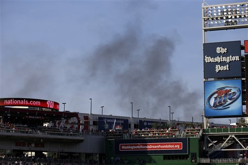 Smoke from Capitol Hill store fire seen for miles
