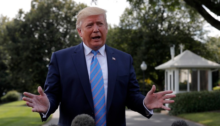 President Donald Trump stops to speak to reporters before departing the White House in Washington, Friday, Aug. 2, 2019, for the short trip to Andrews Air Force Base and onto his Bedminster, N.J., golf club.