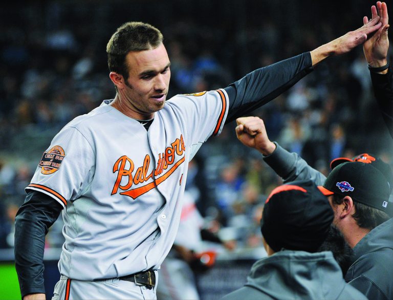 Bill Kostroun/AP
Baltimore Orioles' J.J. Hardy drove in the game-winning run in the 13th inning of Game 4 against the New York Yankees on Thursday.
