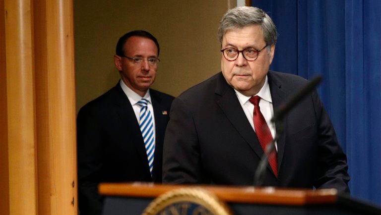 Attorney General William Barr arrives with Deputy Attorney General Rod Rosenstein to speak about the release of a redacted version of special counsel Robert Mueller's report during a news conference, Thursday, April 18, 2019, at the Department of Justice in Washington. 