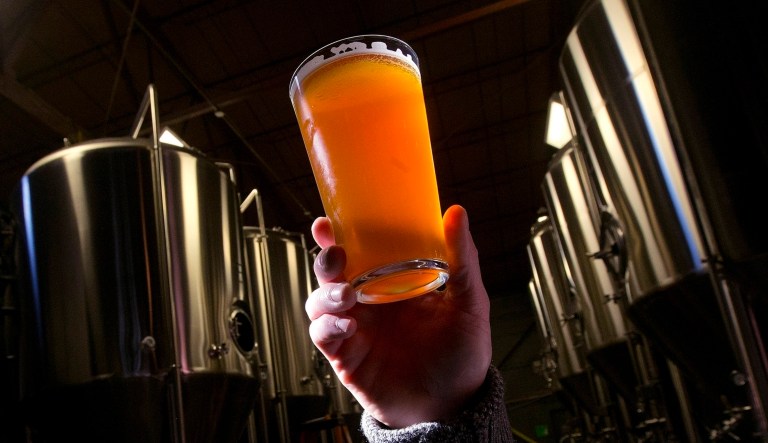 The new tax structure will benefit all alcohol producers, with the largest rate reductions going to small breweries, winemakers, and distillers. (AP Photo/Dave Martin, File)