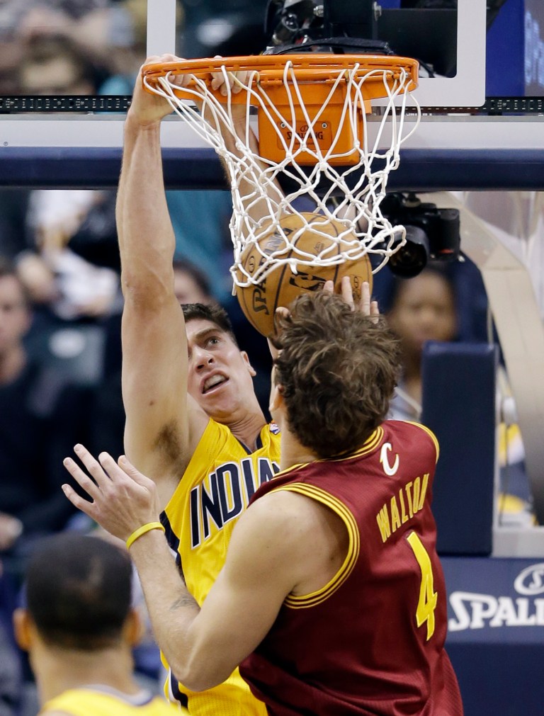   Indiana Pacers' Tyler Hansbrough dunks against Cleveland Cavaliers' Luke Walton during the first half of an NBA basketball game on Wednesday, Dec. 12, 2012, in Indianapolis. (AP Photo/Darron Cummings)  