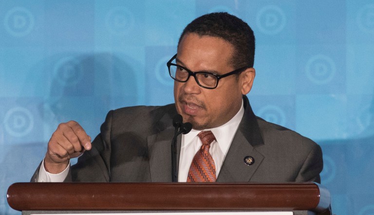 Rep. Keith Ellison, D-Minn., this week posed for a selfie with The Anti-Fascist Handbook, billed as a relatively new historical look at anti-fascism movements past and present. (AP Photo/Branden Camp)