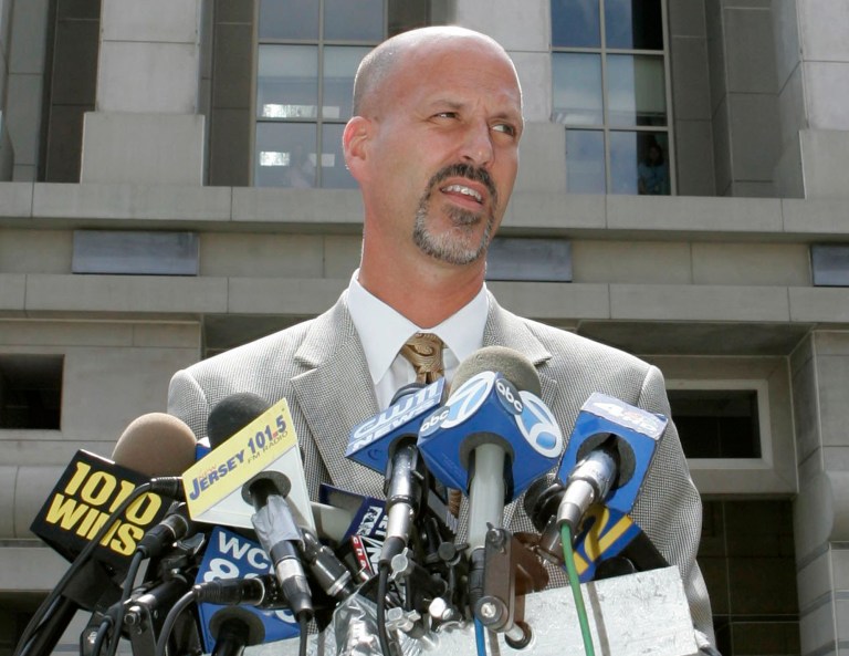 Michael Drewniak, spokesman for the U.S. Attorney's office, speaks to reporters outside the U.S. District courthouse in Newark, N.J. Drewniak, Gov. Chris Christie's long-time press secretary, is set to tell a New Jersey legislative committee what he knew about a political retribution plot carried out by former aides to the governor. Drewniak is the only witness scheduled to testify, Tuesday, May 13, 2014. Two others will appear next month as the committee attempts to determine who ordered the approach lanes of the George Washington Bridge to be blocked without notice last September, and why the mayor whose town is at the base of the heavily traveled span was targeted for payback. (AP Photo/Mike Derer, File)