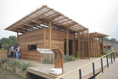 A purpose bullt eco friendly house sits on display at the Solar Decathlon in West Potomac Park on Tuesday.-Graeme Jennings/Examiner