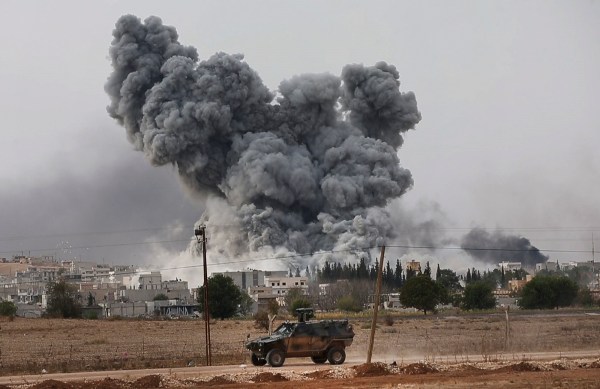 Activists: Kurds halt jihadi advance in Syria town