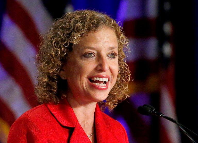 FILE - This Aug. 23, 2013 file photo shows Democratic National Committee chair, Rep. Debbie Wasserman Schultz, D-Fla. speaking in Scottsdale, Ariz. Democrats plan to travel to six cities this summer to evaluate potential sites for the 2016 Democratic National Convention. Officials with the Democratic National Committee are studying how each city might accommodate the tens of thousands of party leaders and activists who will flock to the convention, where the party will nominate its next presidential candidate. Wasserman Schultz is expected to announce the host city later this year or in early 2015.  (AP Photo/Ross D. Franklin, File)