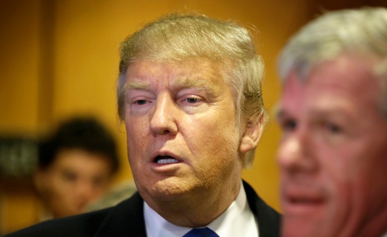 According to his first-hand account of the incident, posted to the Times' website, Trip Gabriel was removed by police from a popular pizza joint where Donald Trump stopped shortly after a campaign rally in Urbandale, Iowa. (AP Photo)