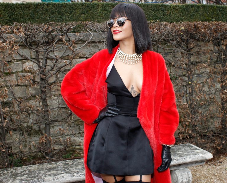 Singer Rihanna poses for photographers before Dior's ready-to-wear fall/winter 2014-2015 fashion collection presented in Paris, Friday, Feb.28, 2014. (AP Photo/Thibault Camus)