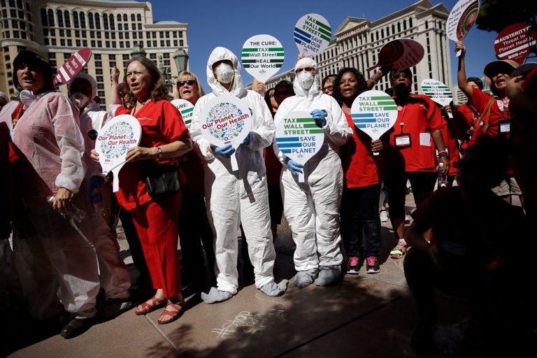 Nurses protest along Las Vegas Boulevard on Sept. 24 in Las Vegas. (AP/John Locher)
