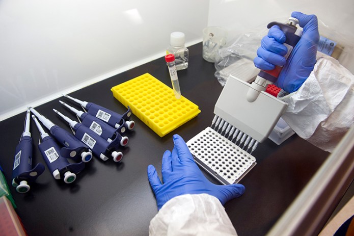 Lawmakers want scientists to spend more time on research instead of administrative tasks. (AP Photo/Cliff Owen, File)