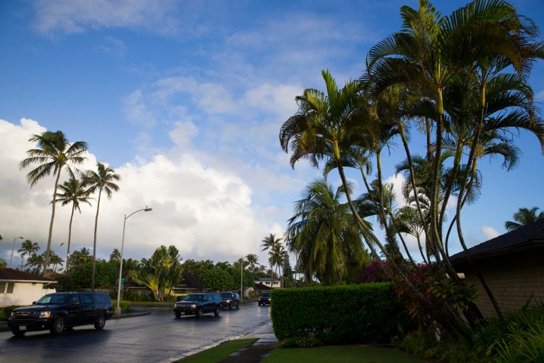 At 7:15 on Thursday night, the the Obama family and their friends pulled into MW restaurant in Honolulu, according to the White House pool report. (AP Photo)