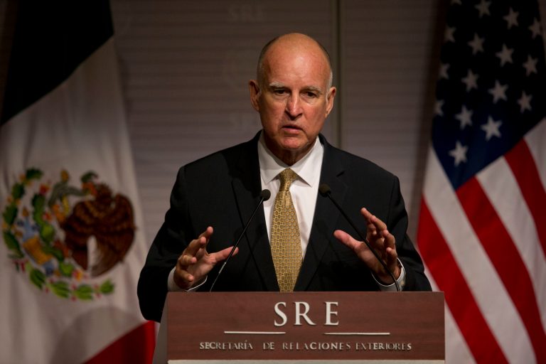California Governor Jerry Brown answers questions from the press during a joint press conference with Mexico's Secretary of Foreign Affairs Jose Antonio Meade in Mexico City, Monday, July 28, 2014. California's governor on Monday kicked off a three day visit to Mexico, where he will discuss immigration in separate meetings with President Enrique Pena Nieto, Central American diplomatic and religious leaders. (AP Photo/Rebecca Blackwell)
