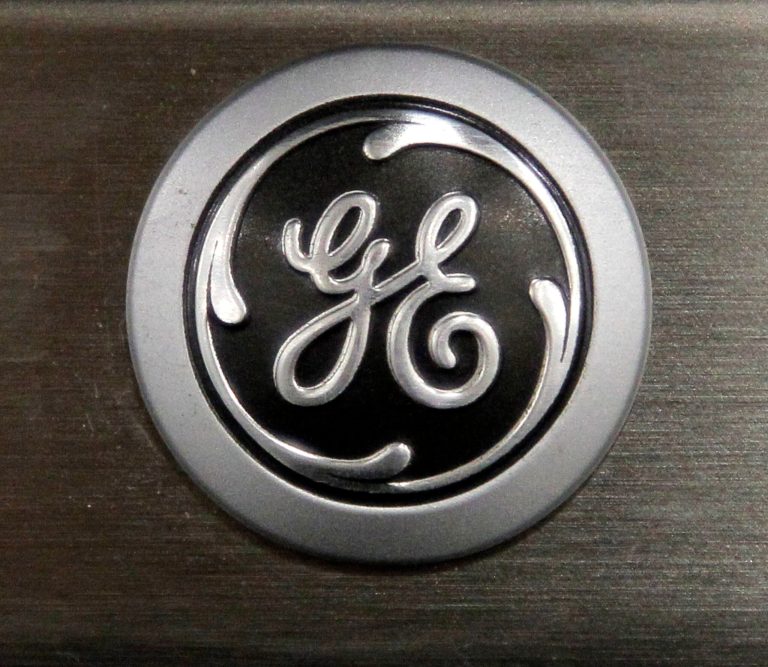 FILE - In this Monday, Sept. 10, 2012 file photo a General Electric logo is seen on a kitchen stove at a Lowe's store in Framingham, Mass.  Industrial companies such as General Electric, Honeywell and Caterpillar, which make expensive equipment that other companies need to buy in order to grow, have been posting strong results in recent weeks and telling investors that orders are strong. (AP Photo/Steven Senne, File)