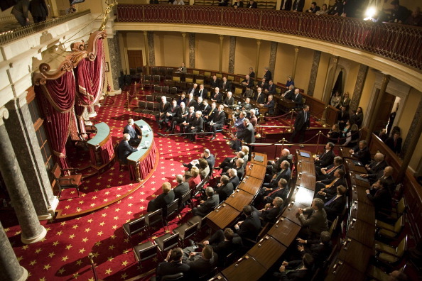Members of the U.S. Senate form a bi-partisan caucus as they gather for a photo in the Old Senate Chamber in the U.S. Capitol on the opening day of the legislative session on Thursday, January 4, 2006, in Washington, DC. (Photo by Chuck Kennedy/MCT/MCT via Getty images)