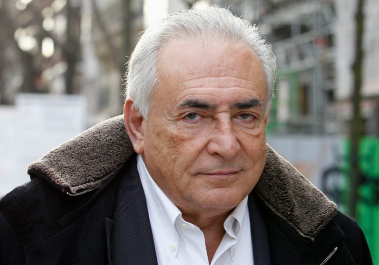   FILE - In this Dec. 11, 2012 file photo, former International Monetary Fund chief Dominique Strauss-Kahn leaves his apartment building in Paris. French judges decided Wednesday, Dec.19, 2012 not to drop aggravated pimping charges against Strauss-Kahn. His lawyer says he will appeal. (AP Photo/Jacques Brinon, File)  