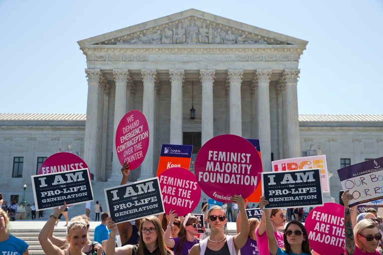 Demonstrators on both sides of the abortion issue stand in front of the Supreme Court. (AP Photo/Alex Brandon)
